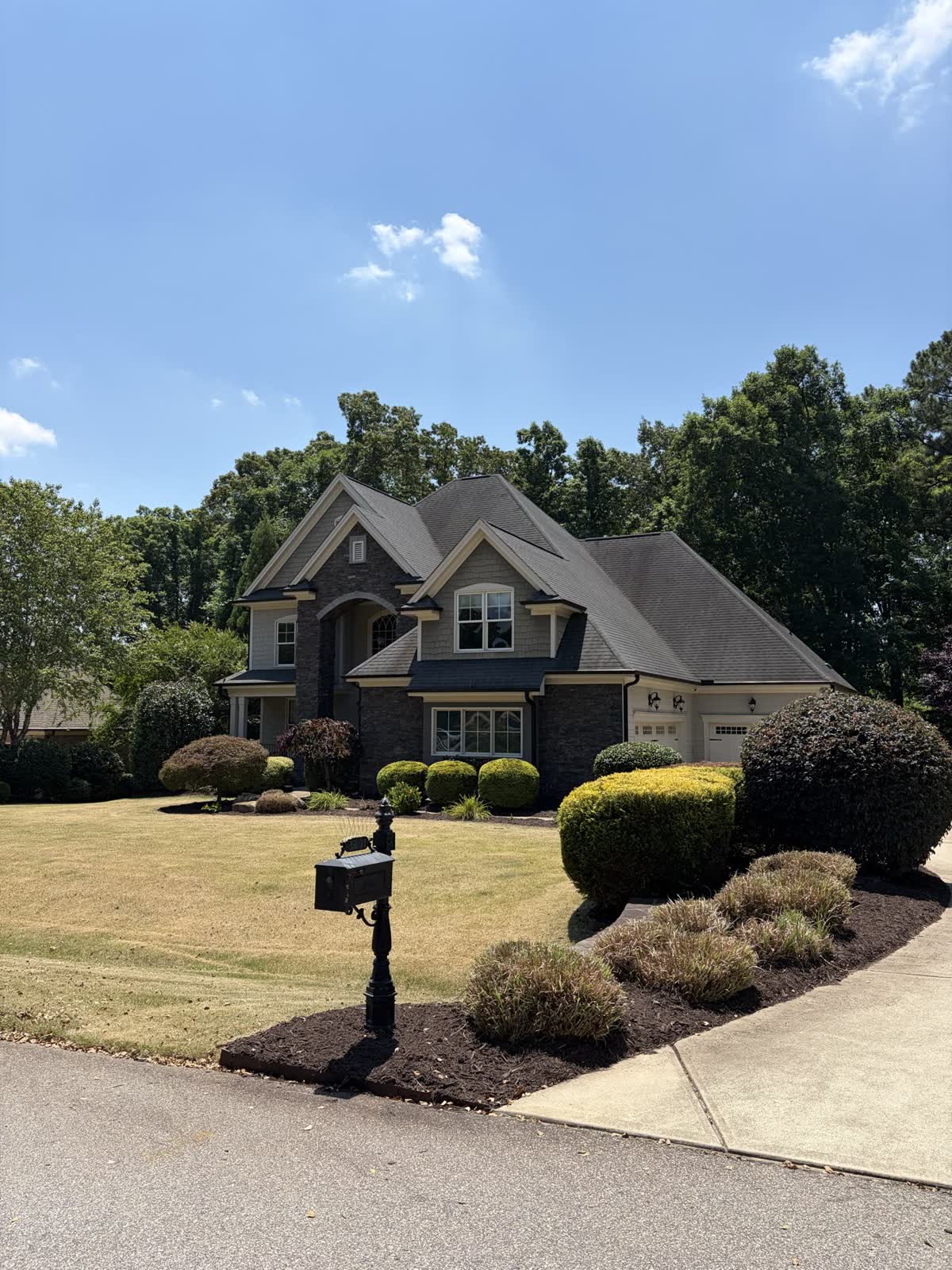 Front landscape after trimming and fresh bed material