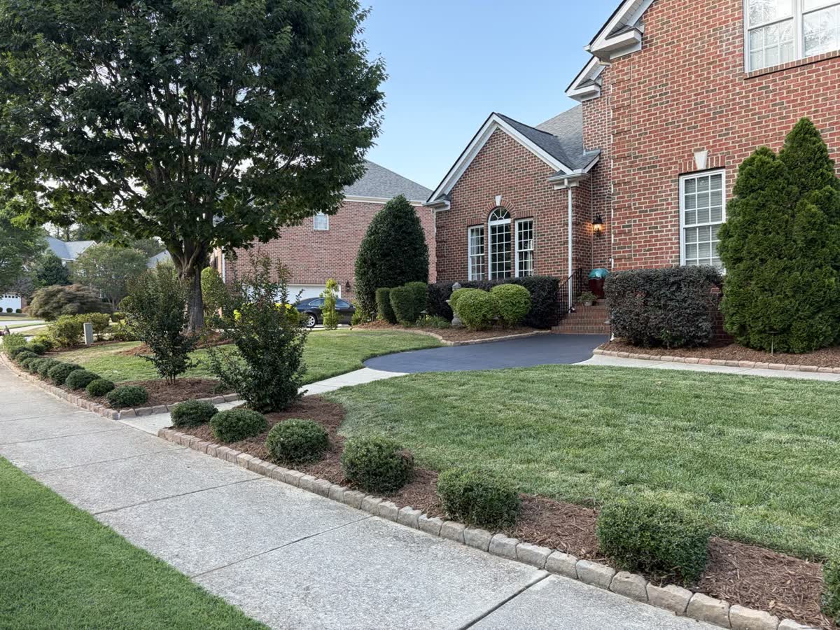 Residential walkway landscaping after maintenance